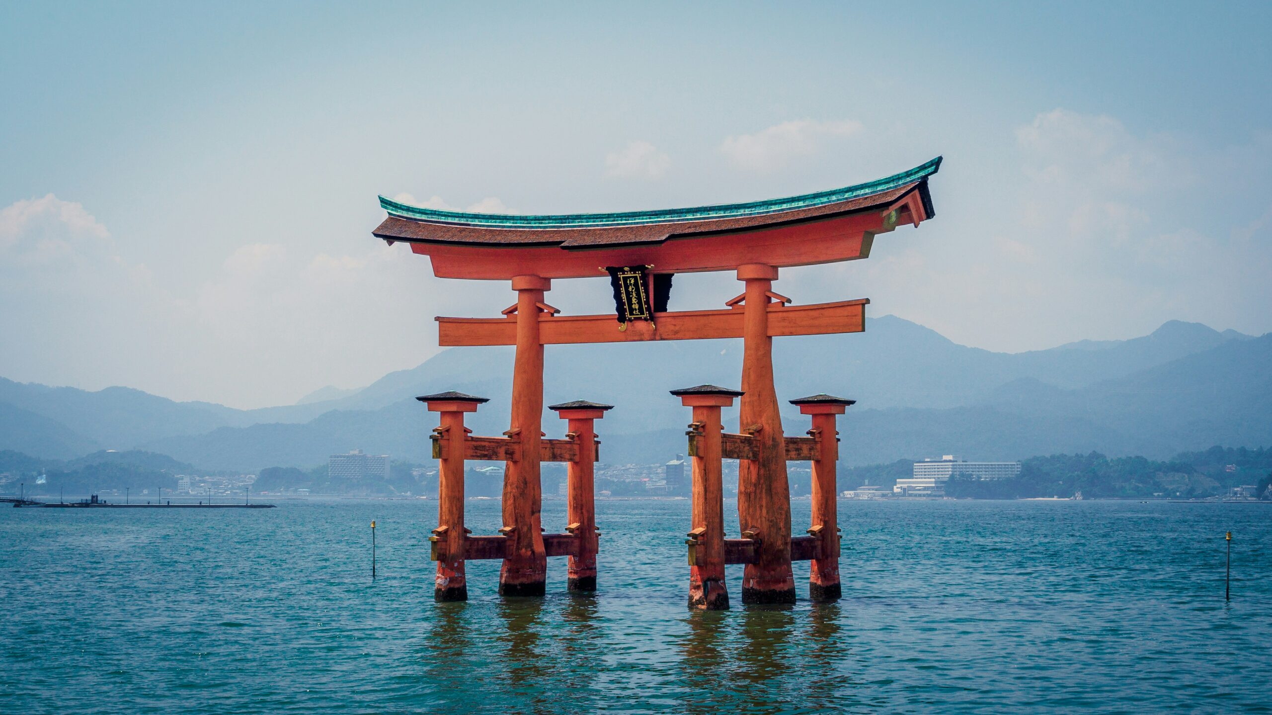 Iconic torii gate at Itsukushima Shrine in Hiroshima, Japan, highlighting the cultural awareness needed for effective SEO localization in Japan