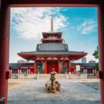 A temple door opening in Japan, symbolizing access to a vast sea of information